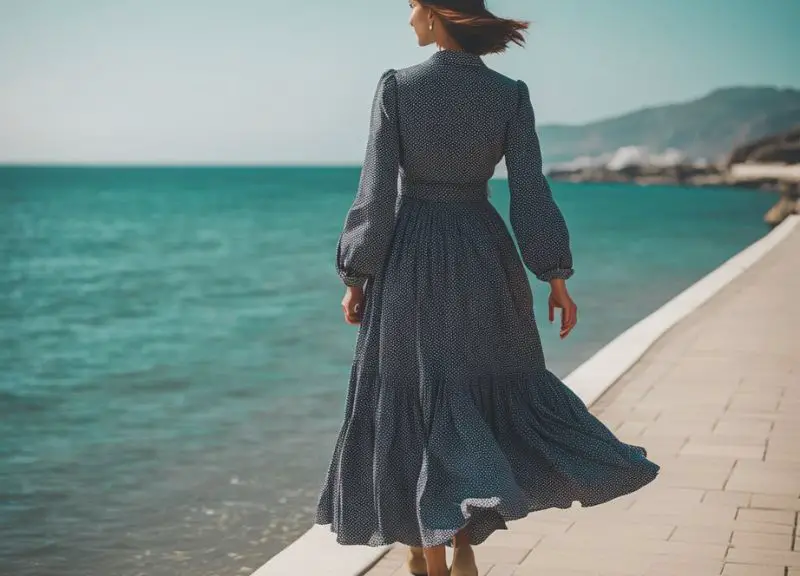 A beautiful woman wears a maxi skirts walking by the sea.